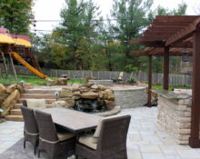 outdoor kitchen installation backyard waterfall