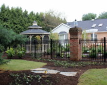 aluminum gate stone pathway landscape