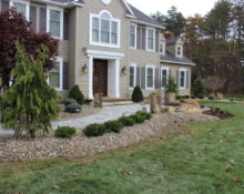 rock bed front yard trees landscaping job