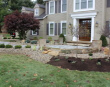 rock bed trees shrubs installation landscaping project