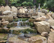 backyard waterfall installation lucas landscaping